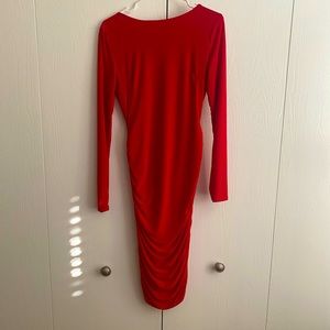 Backless form fitting red dress